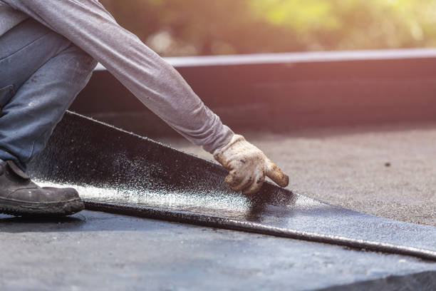 Professional Basement Waterproofing technician working in West Falls, NY